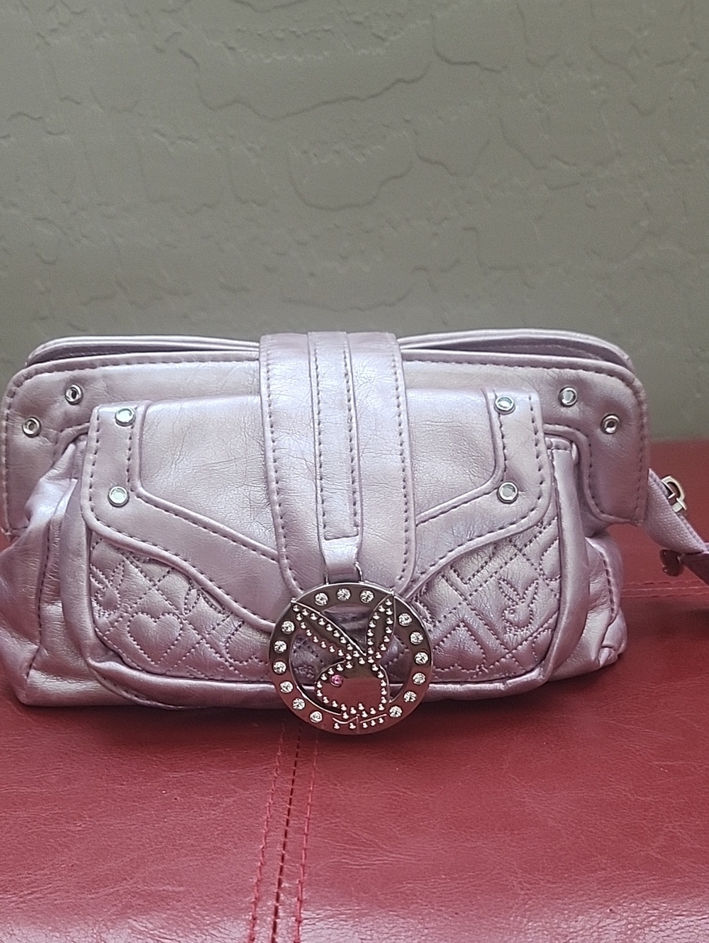 PLAYBOY Metallic Light Pink Quilted Wristlet with Rhinestone Logo